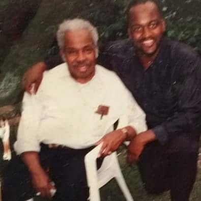 The late Rev. Dr. Andrew J. Brown of Indianapolis with a young Larry Veal