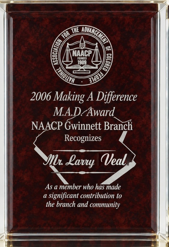 The 2006 Making A Difference Award plaque from the NAACP Gwinnett Branch, engraved &lsquo;Mr. Larry Veal&rsquo;